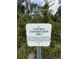 Community's Natural Conservation Area sign indicates protection of native soils and vegetation at 368 Birkdale Dr, Daytona Beach, FL 32124
