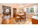 Formal dining room with wood floors, natural light, and room for dinner guests at 39939 Parkinsonia St, Lady Lake, FL 32159