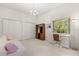 Bedroom featuring built-in shelving, and desk area at 4026 S Lake Orlando Pkwy, Orlando, FL 32808