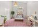 Charming bedroom with unique decor, a desk area, and a bright window at 4026 S Lake Orlando Pkwy, Orlando, FL 32808
