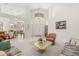 Open-concept living room featuring lots of natural light, high ceilings and tile flooring at 4026 S Lake Orlando Pkwy, Orlando, FL 32808