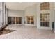 Spacious patio area featuring ample windows to the backyard views at 4026 S Lake Orlando Pkwy, Orlando, FL 32808
