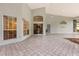 Expansive patio with tile flooring and multiple windows allowing for ample light at 4026 S Lake Orlando Pkwy, Orlando, FL 32808