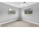 Neutral carpeted bedroom featuring a window allowing plenty of natural light at 4116 Sw 20Th St, Ocala, FL 34474
