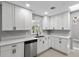 Bright, updated kitchen featuring recessed lighting, stainless steel appliances, and white cabinetry at 4116 Sw 20Th St, Ocala, FL 34474
