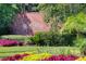 Beautifully landscaped entrance sign for The Plantation at Leesburg community at 4830 Summerbridge Cir, Leesburg, FL 34748