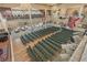 Grand event hall featuring an elevated stage, balcony seating, and elegant chandeliers at 4830 Summerbridge Cir, Leesburg, FL 34748
