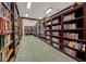 Community Library with floor to ceiling bookshelves at 4830 Summerbridge Cir, Leesburg, FL 34748