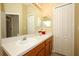 Bathroom with double sinks, large mirror, and storage space in the vanity cabinets at 4954 Alavista Dr, Orlando, FL 32837