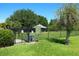 Fenced dog park with shaded gazebo and clear rules, providing a safe and enjoyable space at 4954 Alavista Dr, Orlando, FL 32837
