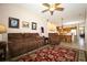 Open concept living room with furniture, ceiling fan and connected kitchen and dining area at 4954 Alavista Dr, Orlando, FL 32837