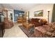 Spacious living area with dining table, comfortable seating, and plenty of natural light at 4954 Alavista Dr, Orlando, FL 32837
