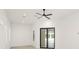 A bright bedroom has a ceiling fan and a view to the pool through a glass door at 5199 Latrobe Dr, Windermere, FL 34786