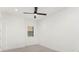 Bright bedroom with a ceiling fan, neutral walls, and natural light at 5199 Latrobe Dr, Windermere, FL 34786