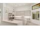 Gourmet kitchen features stainless appliances, center island, and backyard views at 5199 Latrobe Dr, Windermere, FL 34786