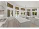 Spacious kitchen with island, stainless appliances, and access to backyard at 5199 Latrobe Dr, Windermere, FL 34786
