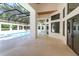 Outdoor pool area features open patio, ceiling fan, and screened-in enclosure at 5199 Latrobe Dr, Windermere, FL 34786