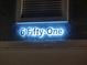 A lighted address sign with the number 6 Fifty-One on a stucco wall at 651 Oak Hollow Way, Altamonte Springs, FL 32714