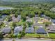 Aerial view of home in established neighborhood with mature trees at 651 Oak Hollow Way, Altamonte Springs, FL 32714