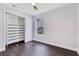 Bedroom with a large closet and hardwood floors at 651 Oak Hollow Way, Altamonte Springs, FL 32714