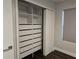 Well-organized closet with sliding doors, built-in shelving, and drawers for optimal storage solutions at 651 Oak Hollow Way, Altamonte Springs, FL 32714