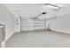 Spacious two-car garage with bright lighting and ample storage space for vehicles and equipment at 651 Oak Hollow Way, Altamonte Springs, FL 32714