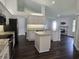 Bright, updated kitchen with granite counters, stainless steel appliances, and center island at 651 Oak Hollow Way, Altamonte Springs, FL 32714