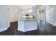 Modern kitchen featuring an island, white cabinets, and stainless appliances at 651 Oak Hollow Way, Altamonte Springs, FL 32714
