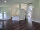 Spacious living room with modern archways, recessed lighting, and dark wood flooring at 651 Oak Hollow Way, Altamonte Springs, FL 32714