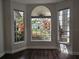 Cozy living room with bay windows offering great views of the landscaped outdoors at 651 Oak Hollow Way, Altamonte Springs, FL 32714