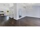 Bright living room featuring wood floors, modern lighting, fireplace, and neutral paint at 651 Oak Hollow Way, Altamonte Springs, FL 32714
