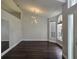 Bright living room featuring dark floors, vaulted ceiling, and large picture windows at 651 Oak Hollow Way, Altamonte Springs, FL 32714