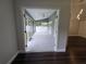 View of screened-in patio with tiled floor and access to the outdoors at 651 Oak Hollow Way, Altamonte Springs, FL 32714