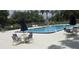 Enjoy the community pool with plenty of seating and shade for those sunny Florida afternoons at 651 Oak Hollow Way, Altamonte Springs, FL 32714