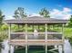 Charming gazebo over water, perfect for relaxing and enjoying nature at 6947 Cucamelon Ct, Windermere, FL 34786