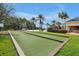 Outdoor bocce ball court featuring well-maintained turf and border, perfect for community recreation at 7616 Cabana Ct # 301, Reunion, FL 34747