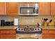 Close-up of kitchen with modern appliances and granite countertops at 7616 Cabana Ct # 301, Reunion, FL 34747