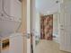 Washer and dryer hookups conveniently located next to bathroom with shower and tub at 7616 Cabana Ct # 301, Reunion, FL 34747