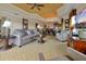 Spacious living room with stylish furniture, tray ceiling, and open floor plan at 7616 Cabana Ct # 301, Reunion, FL 34747