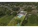 A complete aerial view of the property showcasing the pool and backyard at 8120 Gondola Dr, Orlando, FL 32809