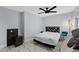 Modern bedroom featuring stylish furniture, a comfortable bed, and neutral wall colors at 8120 Gondola Dr, Orlando, FL 32809