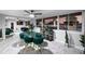 Elegant dining room with marble floors and views of the backyard pool at 8120 Gondola Dr, Orlando, FL 32809