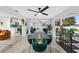 Open concept home featuring modern dining and living area with marble floors at 8120 Gondola Dr, Orlando, FL 32809