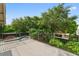 Spacious balcony overlooking a lush backyard with a swimming pool and mature trees at 830 Oak St, Orlando, FL 32804