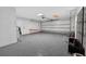 Spacious two-car garage features epoxy flooring, ample storage space, and an automatic door opener at 830 Oak St, Orlando, FL 32804