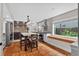 Well-lit kitchen with an island, stainless steel appliances, and stylish fixtures at 830 Oak St, Orlando, FL 32804