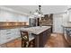 Open kitchen featuring a center island, stainless appliances, and lots of counter space at 830 Oak St, Orlando, FL 32804