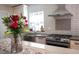 Beautiful kitchen with stainless appliances, white cabinets, and modern countertops at 830 Oak St, Orlando, FL 32804