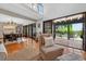 Open concept living and dining area with backyard access at 830 Oak St, Orlando, FL 32804