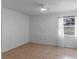Bright bedroom with tile flooring, natural light and a ceiling fan at 856 Mendoza Dr, Kissimmee, FL 34758